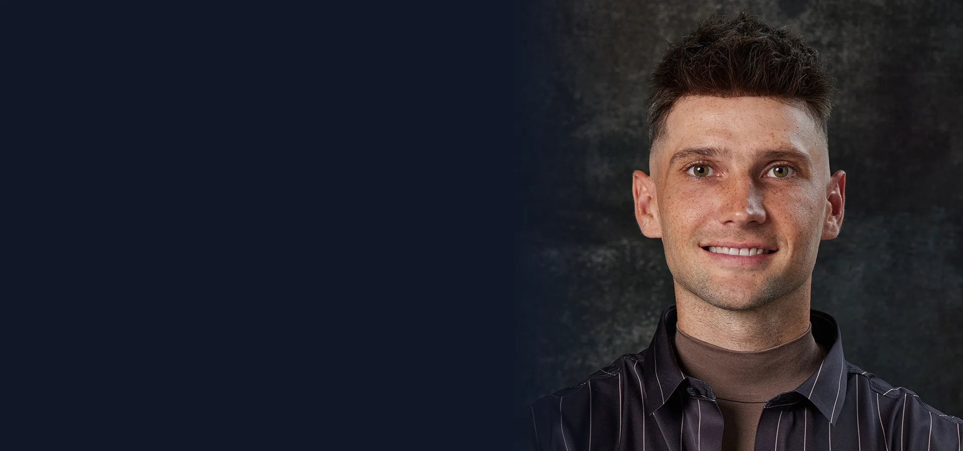 Smiling man with a natural short hairstyleslider_item_1
