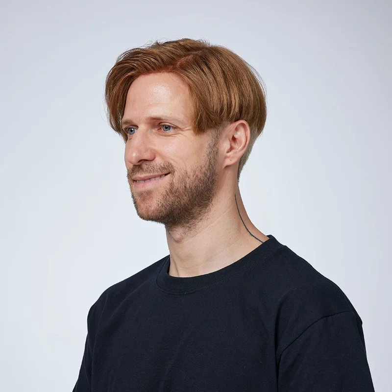 Man with a custom copper hair color