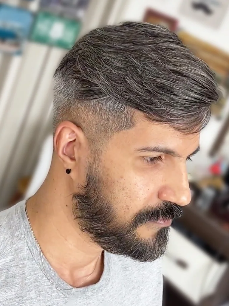 Man with grey hair in a barbershop