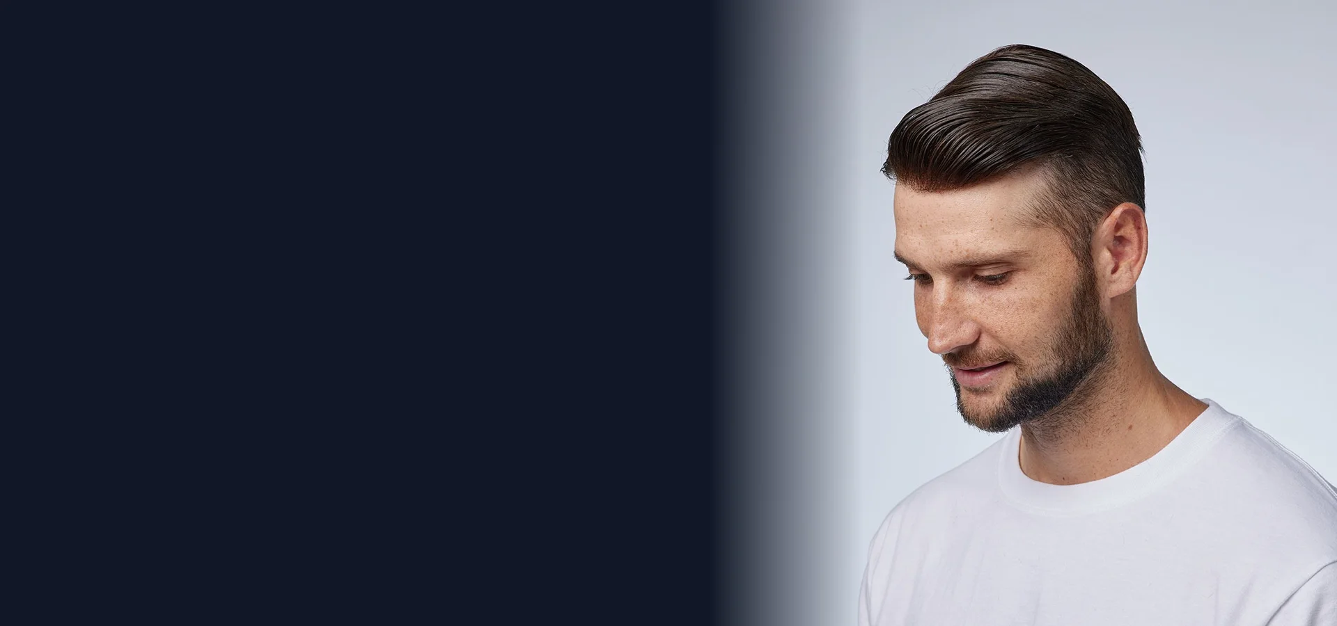 Man with a side-swept hairstyle and natural hairlineslider_item_2