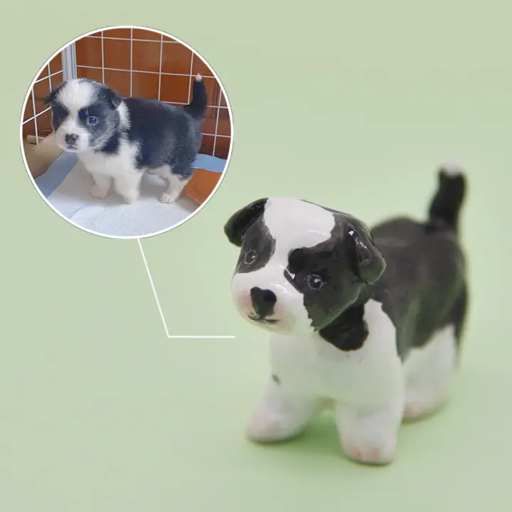 A pet photo beside the hand-painted clay figurine made from it