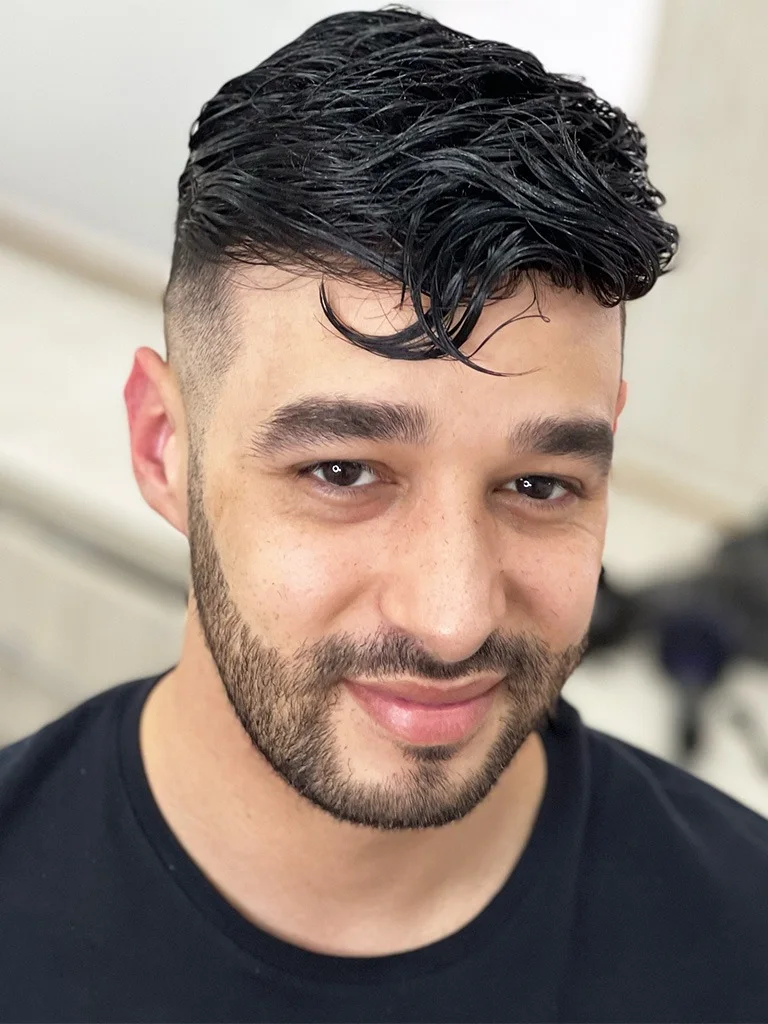 Man with short curly hair
