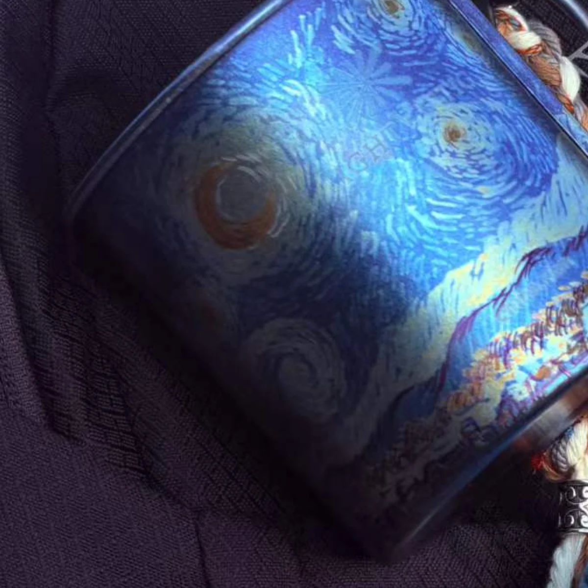Camp mug painted with swirling stars inspired by Van Gogh's The Starry Night